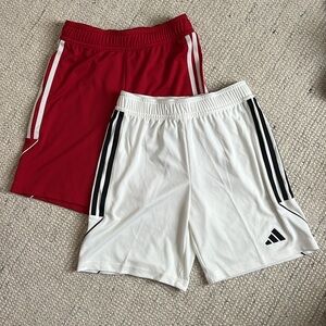Two pairs Adidas Tiro 23 shorts, red/white, size 11-12 Y